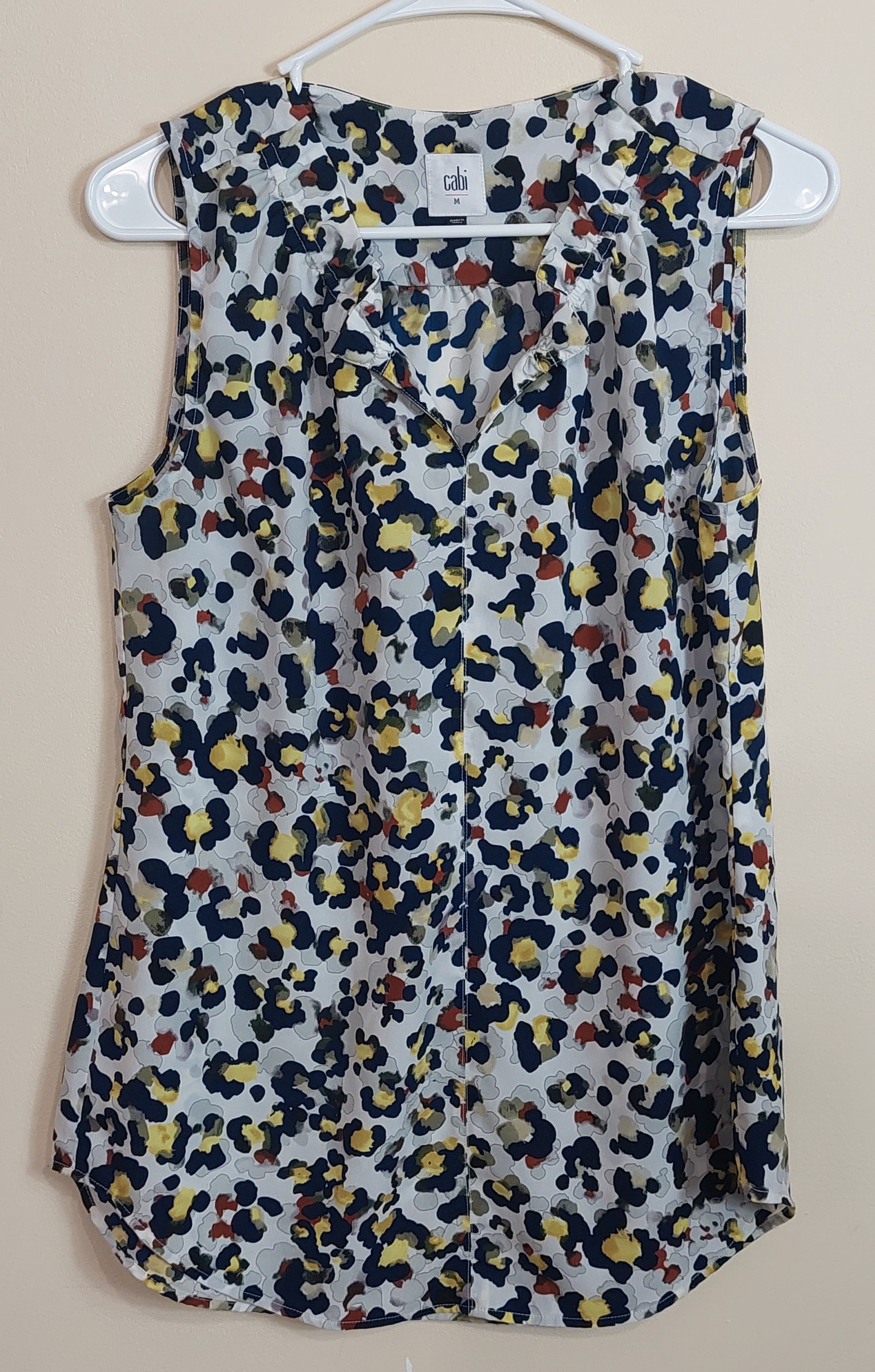 3 41 CAbi Medium Sleeveless Blouse White Navy Yellow Rust Abstract Animal Print Ruffle V Neck Lightweight Boutique Favorite