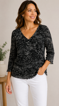 9-18 Chico’s Design Size Large  Black White Animal Print V-Neck 3/4 Sleeve Top
