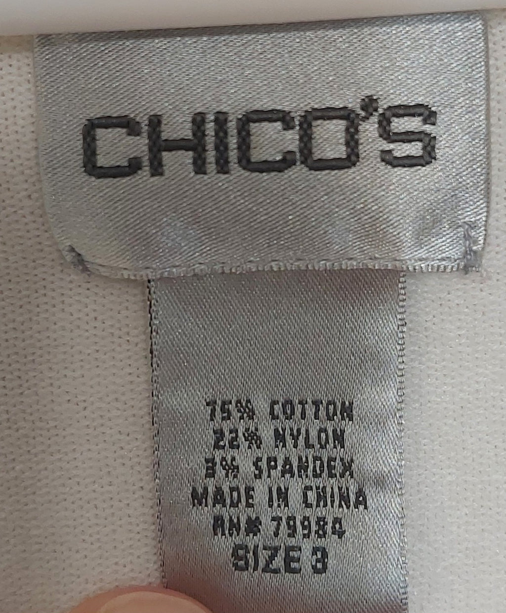 7 24 Chicos Size 3 White V Neck Side Tie Pocket Top